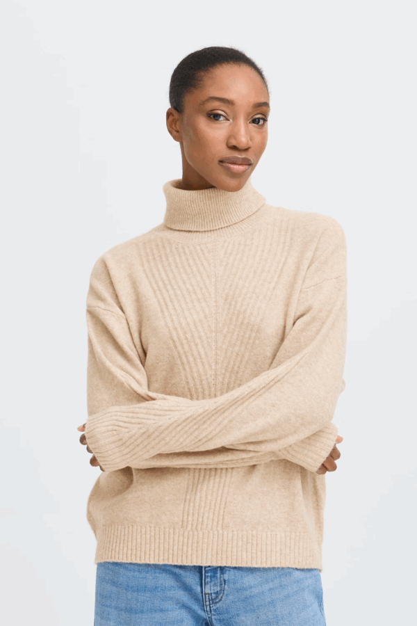 Pull col roulé beige