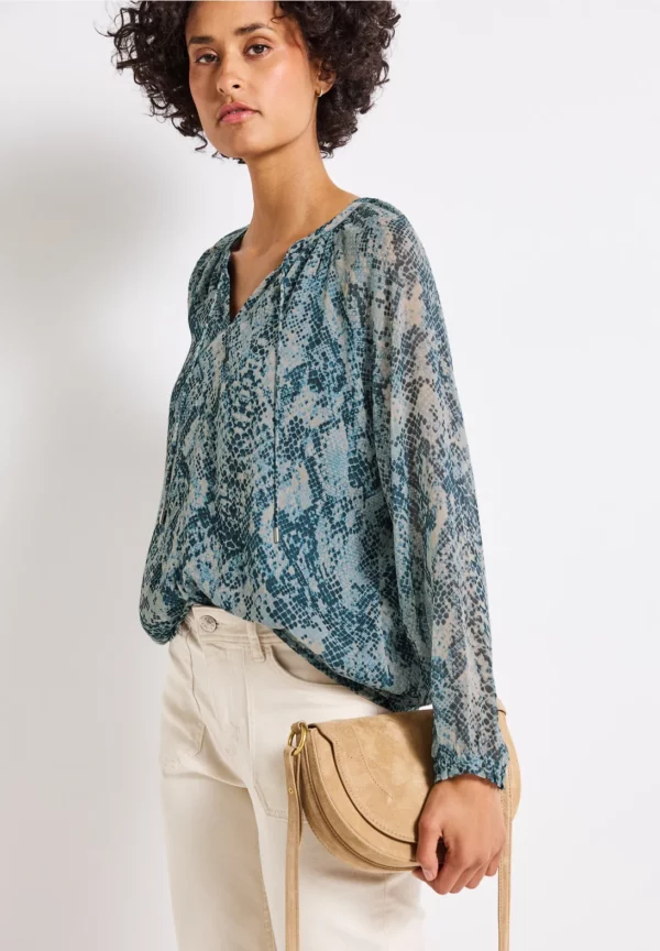 Blouse manches transparentes