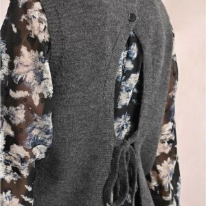 Pull sans manches ouvert dans le dos